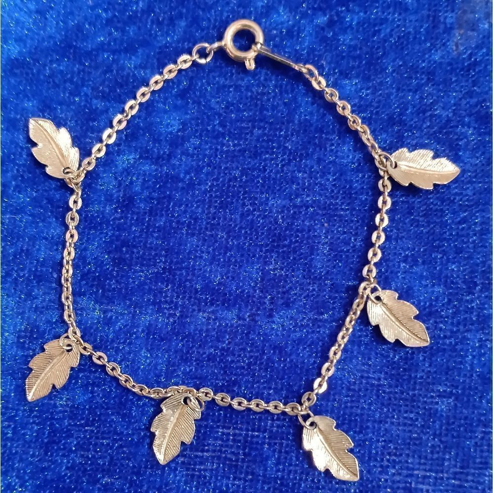 AVON golden leaf charm bracelet